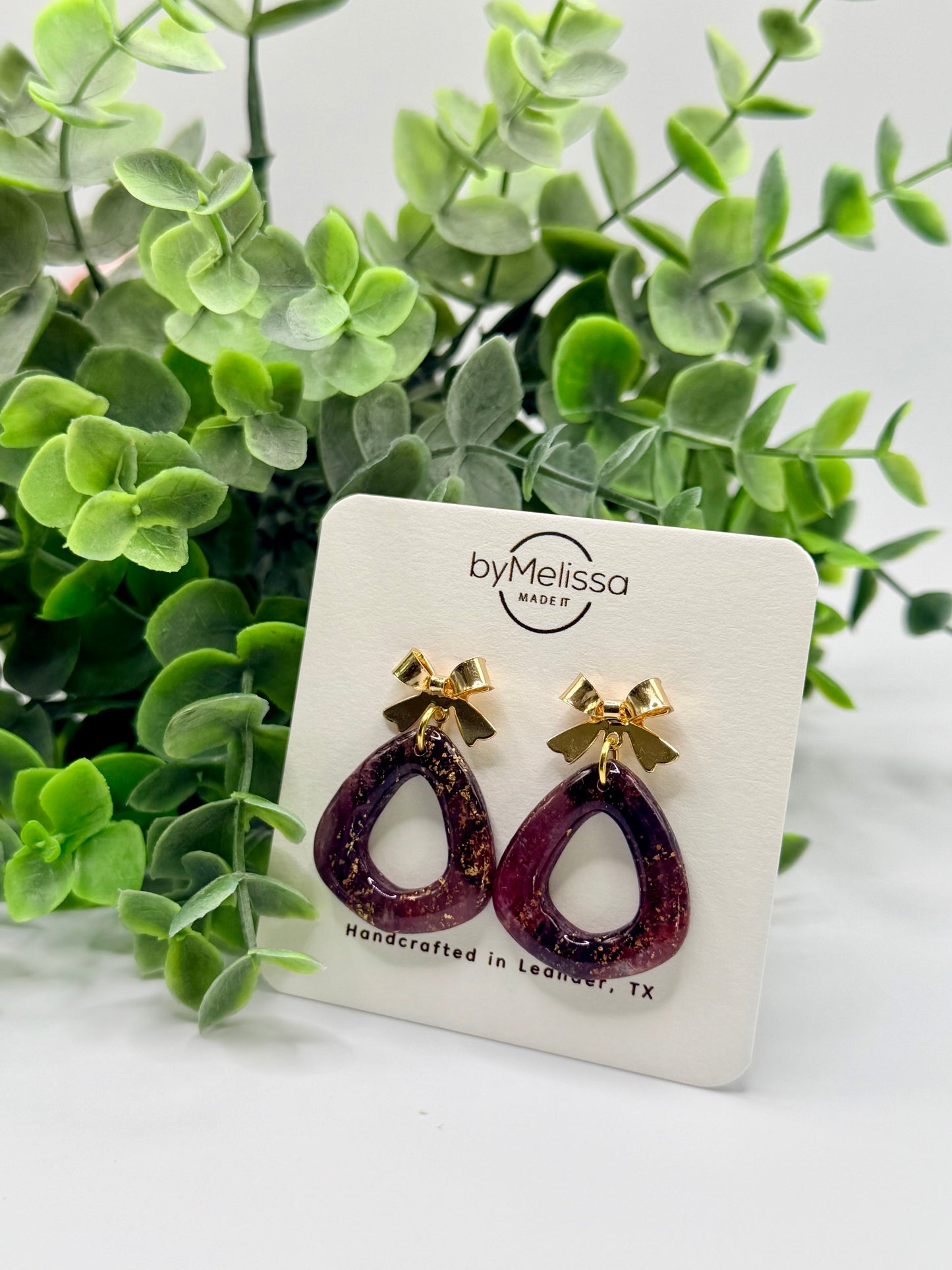 Maroon and Black Open Triangle Drop with Gold Bows