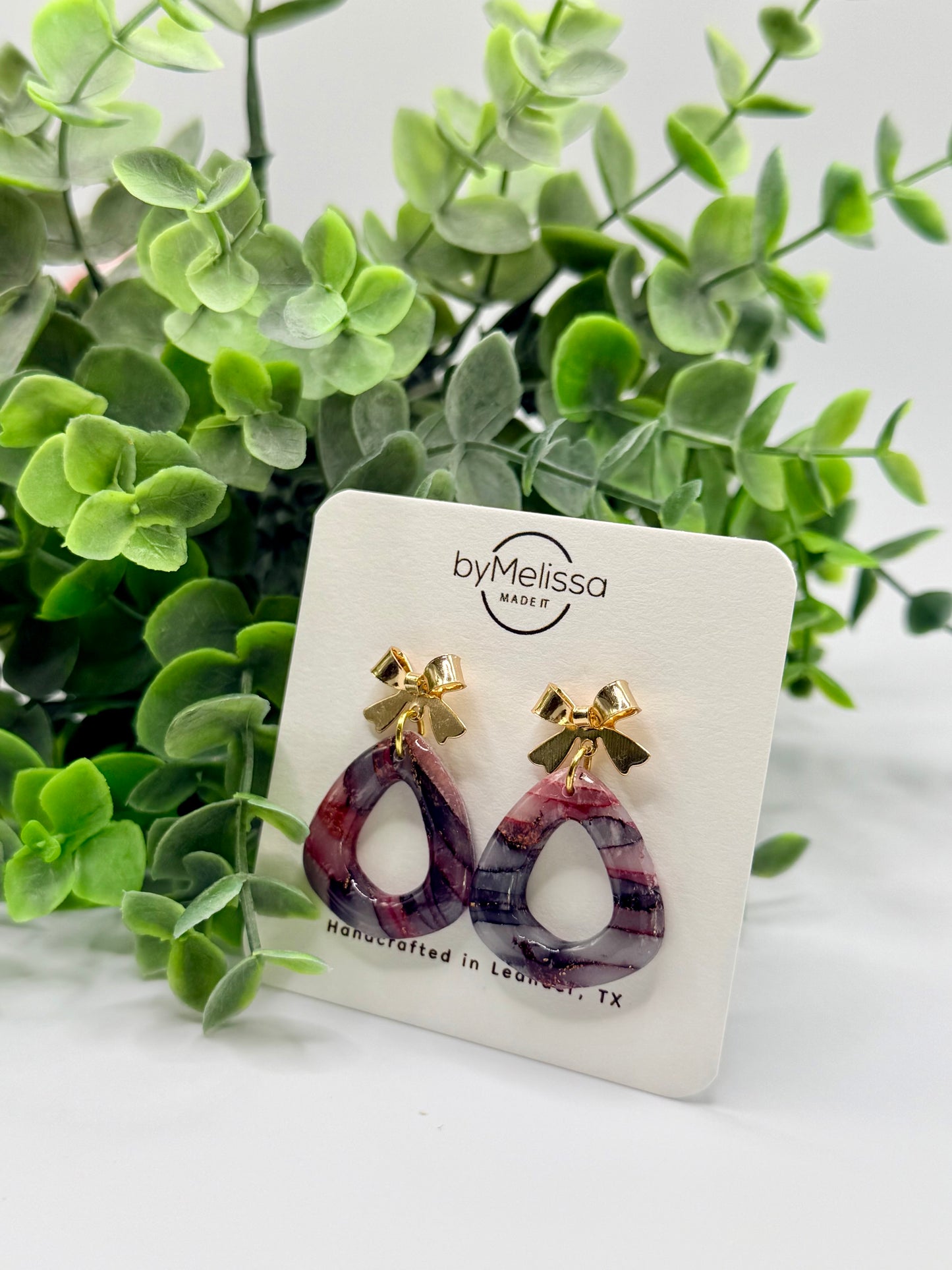 Maroon and Black Open Triangle Drop with Gold Bows