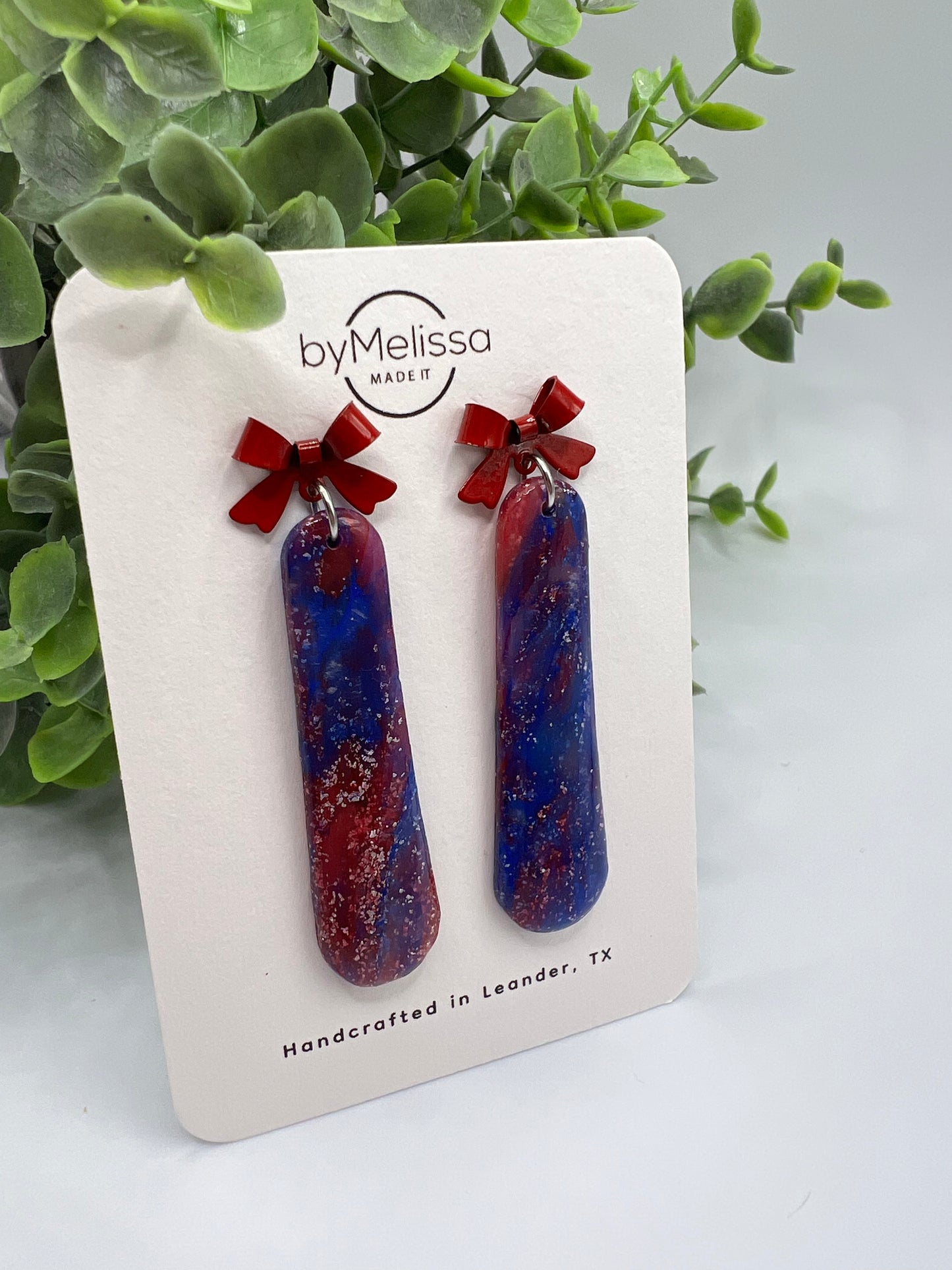 Red and Blue Rounded Bar Drop Earrings with Red Bows